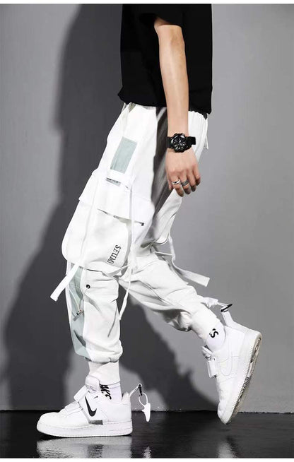 Pantalones harén con cintas casuales y múltiples bolsillos