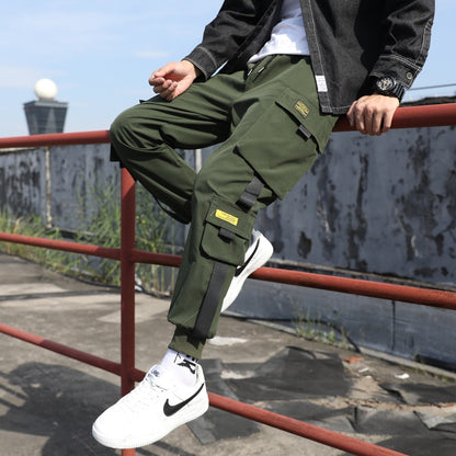 Pantalones harén con cintas casuales y múltiples bolsillos